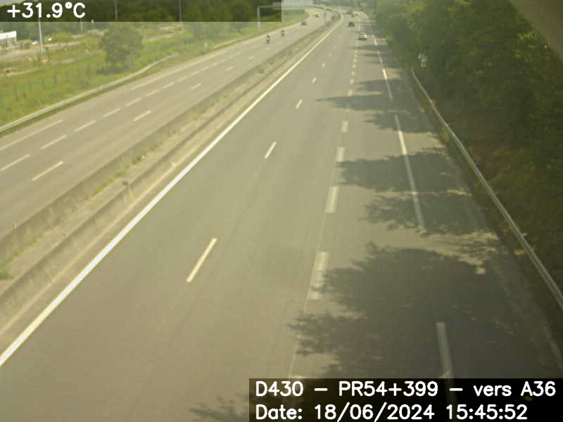 Webcam sur la D430 à hauteur d'Auchan Mulhouse, quelques centaines de mètres avant la jonction avec l'A36. Vue orientée vers Mulhouse